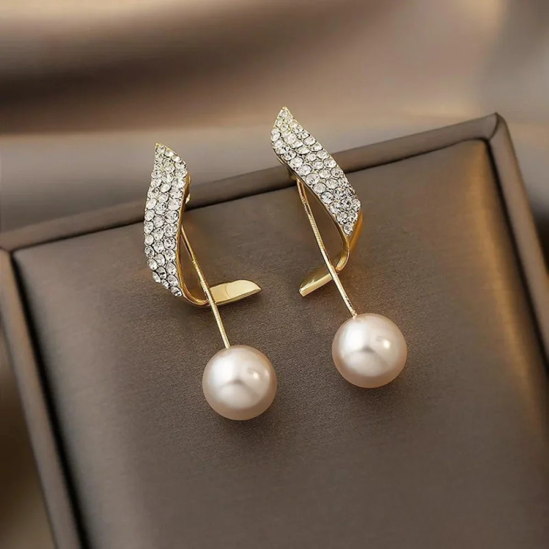 Elegant Gold Earrings Featuring Pearl Drops